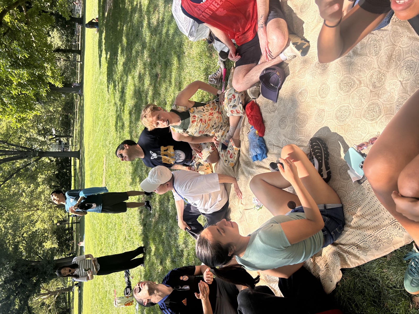 The lab sitting together on picnic blankets