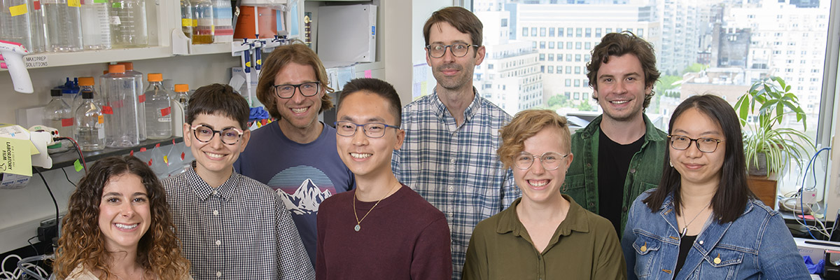 The Maciejowski Lab, with the New York City skyline behind them